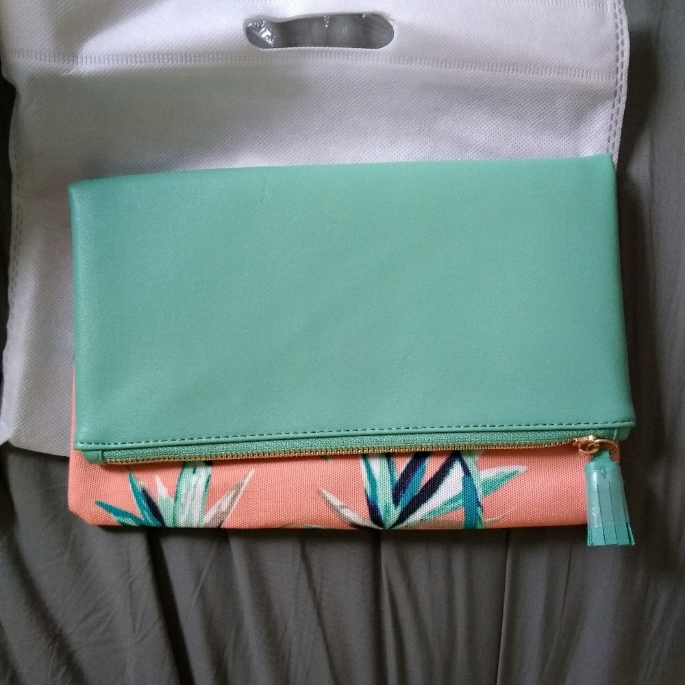 Rachel Pally reversible clutch